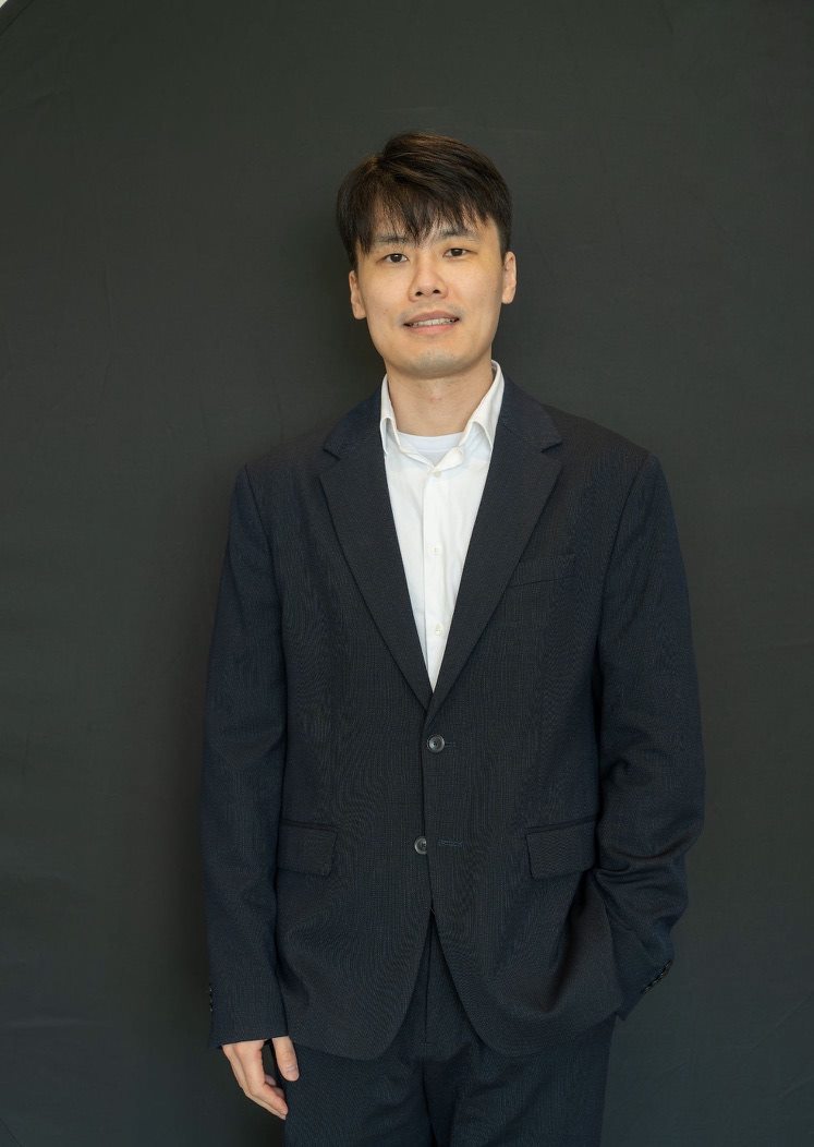 Dr. Brian Gao in professional clinical attire
