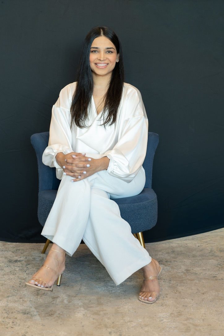 Dr. Aisha Sadaf in professional clinical attire