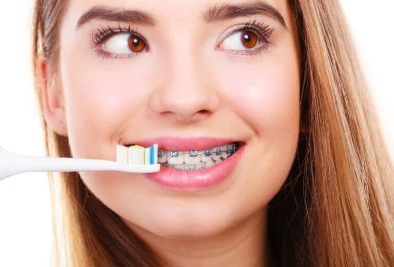 A lady with brush and braces
