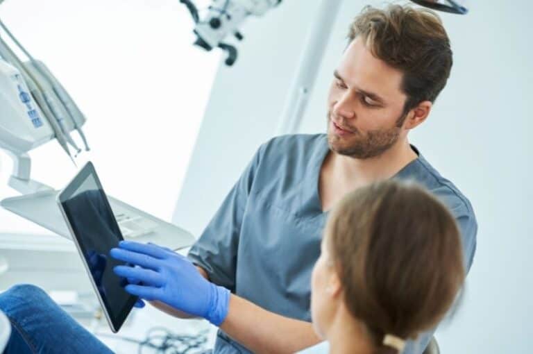 A dentist is giving consultations about orthodontic