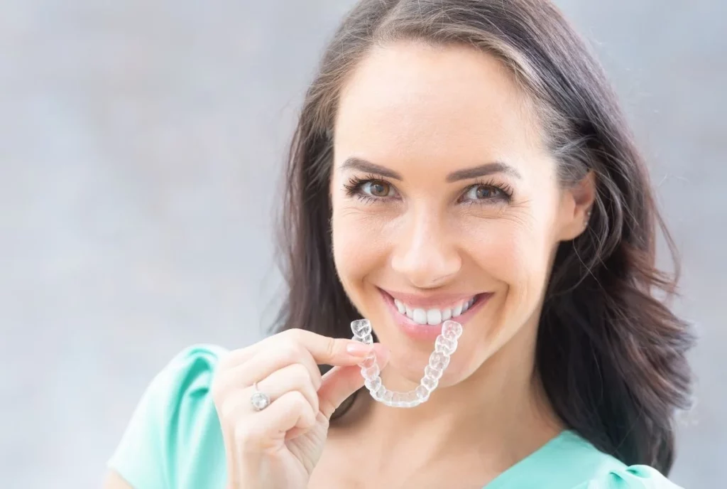How much does it cost to get dental braces and Invisalign in